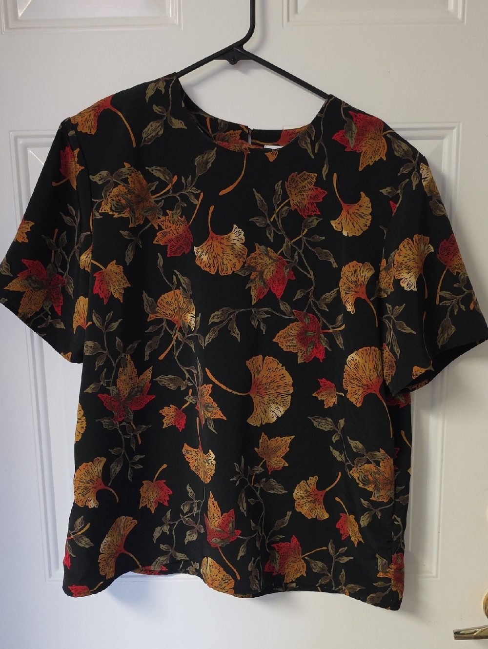 Susan Graver Black Floral Blouse with Orange and Gold Accents